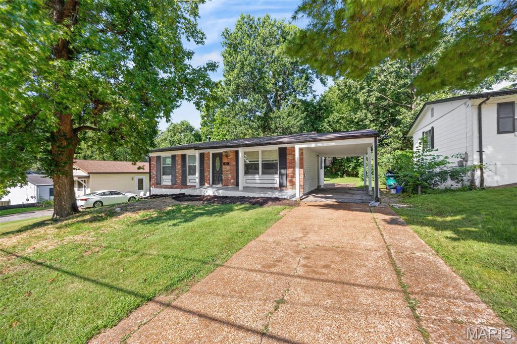 **SELLER FINANCING OPTION AVAILABLE — 5% DOWN, NO BANK QUALIFYING!!**
Seller financing available on this property, offering qualified buyers an alternative to traditional mortgage financing.
Down Payment: 5%
Interest Rate: 6.3984% fixed
Amortization: 30 years
Term/Maturity:5 years
Monthly Payment: $2,450/month, including estimated principal, interest, and property taxes.

Welcome to Webster Groves! This beautifully updated home is ready for its next owner. You'll appreciate the convenience of off-street parking for two vehicles, including a covered carport. The side entrance provides easy access to the kitchen, making unloading groceries simple, while guests are welcomed through the covered front porch into a bright, inviting living room that flows seamlessly into the kitchen.

The main level features refinished hardwood floors, while the lower level offers new luxury vinyl plank flooring. The updated kitchen includes granite countertops with generous seating, stainless steel appliances, and updated lighting, making it a functional space for everyday living and entertaining. Down the hall are three comfortable bedrooms with ample closet space and a full bathroom featuring custom cabinetry. The primary bathroom has been refreshed with a new vanity, flooring, and paint.

The finished lower level provides exceptional flexibility with multiple finished spaces that can be used as a recreation room, home office, fitness area, hobby room, or additional living space to fit your needs. Fresh paint and updated lighting create a bright, welcoming atmosphere throughout.

Conveniently located in the Webster Groves School District, this move-in-ready home offers updated finishes, flexible living space, and a location close to shopping, dining, parks, and major commuter routes.

**Agent Owned.**