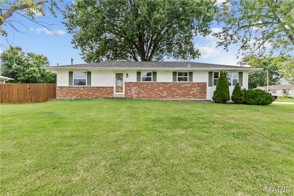 Welcome to 1205 Cypress Drive, an impressive 3-bedroom, 4-bathroom (2 full, 2 half) ranch-style home offering fantastic flexible living space and wonderful curb appeal in the heart of O’Fallon! Step inside to discover a seamless open-concept main floor connecting the living room, breakfast area, and a light-filled kitchen featuring white cabinetry with crown molding, a gas range, microwave, dishwasher, and porcelain tile flooring. Down the hall, the comfortable primary suite serves as a private retreat with a corner jetted tub, separate shower, raised-height vanity, and ceramic tile flooring. Two additional well-proportioned bedrooms, laminate wood flooring, white 6-panel doors, and ceiling fans complete the main level.

The living space extends into the partially finished lower level, which offers a large recreation room, two spaces for use as an office or bonus room, a laundry area, and a convenient half bath. Step outside to enjoy the fully fenced, level backyard ideal for outdoor entertaining and relaxing under mature shade trees. Complete with a partial brick exterior, low-maintenance vinyl siding, an oversized side-entry two-car garage, and an HVAC system updated in 2017, and a new roof, gutters, and downspouts, this home combines long-term comfort with low-maintenance living. Best of all, you're just minutes from Highway 70, Civic Park, Alligator’s Creek Aquatic Center, and local dining within the desirable Fort Zumwalt School District—making this an incredible opportunity you won't want to miss!