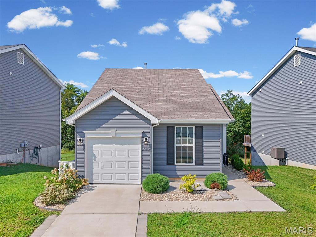 Built in 2023, with an attached garage, main-floor laundry, finished walkout lower level and an expansive composite deck added in 2025, this like new ranch home offers an easy-to-manage floor plan with upgrades already completed. The bright, open main level features a vaulted ceiling, natural light throughout and an impressive kitchen with quartz countertops, stainless steel appliances, large breakfast bar, 42-inch cabinetry and pull-out shelving.

Both bedrooms are located on the main floor, including the primary bedroom with a walk-in closet and direct access to the full bath. The walkout lower level adds flexible finished living space, a second full bathroom and room for a family room, home office, workout space or hobbies.

Outside, skip the expense and construction projects. A new expansive composite deck (2025) overlooks a level backyard backing to wooded common ground with no homes directly behind you, and is the perfect spot for relaxing or entertaining. Newer construction, additional finished living space in the lower level, attached garage and substantial outdoor improvements make this home stand apart from many similar floor plans. Located in a USDA-eligible area, qualified buyers may also have access to 0% down financing options!!