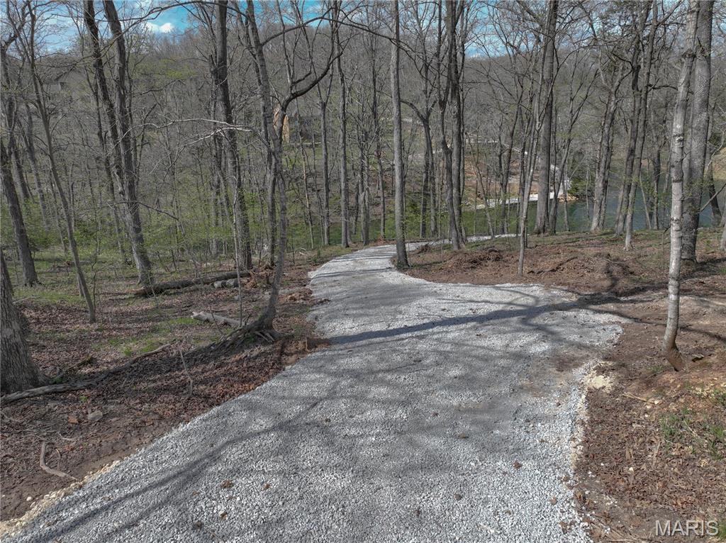 GREAT VIEWS, EASY ACCESS, TERRIFIC PRIVACY are just a few of the descriptions for this fantastic home site on Lake Alpine.  With not many lots left to choose from, now is a great time take a look and discover the splendor of lake living! This property offers 273 feet of shoreline frontage on the largest lake Innsbrook has to offer! For the fishing enthusiast, this lake offers some of the best anywhere. Come visit Innsbrook to see for yourself how this location would compliment your future dream home.