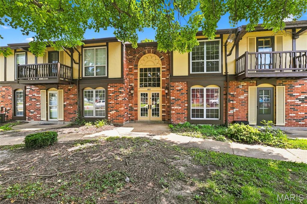 Gorgeous ground level unit, NO STEPS in The Heart of Florissant!!! Trash, Water and Sewer are Included!  Nestled in a beautiful tree-lined community with sidewalks throughout, this inviting neighborhood also features a community pool, perfect for relaxing on warm summer days. Convenient off-street parking adds to the ease of everyday living.   Carefree Living with NO Exterior Maintainance. Units in this complex rarely come available, this is a no rental property complex and has been for a long time, pride of ownership shows throughout the neighborhood. Private lobby entrance and a backdoor for direct access to the rear patio. Generous sized Living Room ajoining Dining Room, Plenty of Countertops in Kitchen with access to the patio perfect to BBQ. 2 Beds and 2 Full Baths! HVAC was replaced July 2025.  Backs to Open Ground & a Church. Enjoy a highly walkable location just steps from grocery shopping, dining, hardware stores, and retail conveniences, and public transportation is located less than a block away for added accessibility. Whether you're looking to downsize, or purchase your first home, this well-maintained condo offers comfort, convenience, and carefree living at an exceptional value. PASSED OCCUPANCY INSPECTION ALREADY IN PLACE!