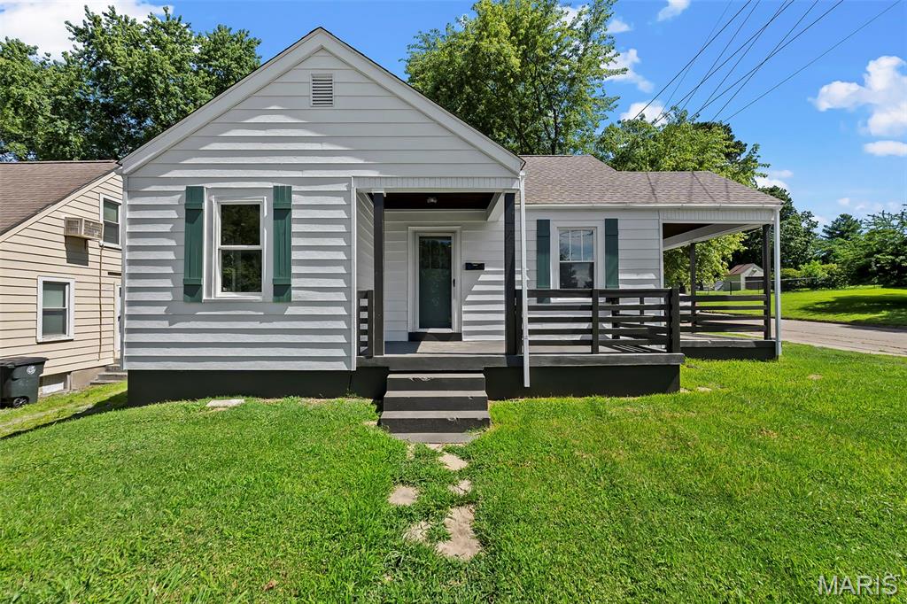 Welcome to this charming Bungalow that sits on the corner of Bloomfield and Minnesota, just steps from Jefferson School. Recent upgrades include a new roof, freshly painted siding & foundation, new shutters, and refinished hardwood floors. The kitchen boasts a new refrigerator and stove as well as new countertops and flooring.   The fresh neutral paint adds warmth and brightness to the entire interior.  This home offers comfort, convenience, and modern updates. With over 1,500 square feet of living space, the newly carpeted upstairs adds an additional sleeping room, recreation area or a nice office.  In addition to the 2026 improvements, windows were installed in 2019 and a brand-new AC unit was added in 2023.  plumbing was upgraded to pex in 2026.