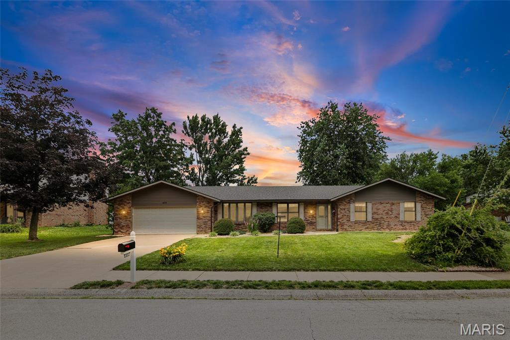Immaculate, Thoughtfully Updated Stunning Ranch in O’Fallon! Welcome to this beautifully maintained 3-bedroom, 2 bath one story ranch, where comfort meets timeless elegance style. A desirably designed open concept layout and large windows fill the home with natural light, creating a warm and inviting atmosphere from the moment you enter. The heart of the home is the welcoming great room with a cozy fireplace, flowing seamlessly into the bright gourmet kitchen complete with granite countertops, black and SS appliances, double oven, abundant cabinetry, two pantries, and a charming breakfast nook with bay window overlooking the private backyard. Separate living room and formal dining room provide comfortable spaces for both everyday living and special gatherings.  A spacious primary bedroom suite offers a peaceful retreat, featuring a walk-in tile shower and generous dual closets. Thoughtfully selected updates throughout the home including new flooring, fresh interior paint, and modern lighting create a bright welcoming atmosphere. Step outside to enjoy the fenced, wooded backyard offering privacy and a serene setting to relax or entertain. With major updates including a new roof and gutters (2025), water heater (2025) and HVAC system (2021), this home reflects exceptional care and pride of ownership. A list of all renovations and upgrades is available. Ideally located in the sought-after O’Fallon School District, with convenient access to SAFB, I-64, St. Louis, shopping, dining, parks, and local wineries. Home is ready to welcome you with quick occupancy. Don’t miss the opportunity to make this stunning exceptional home yours.  Call and schedule your private showing today!  A must-see, and it won’t last long!