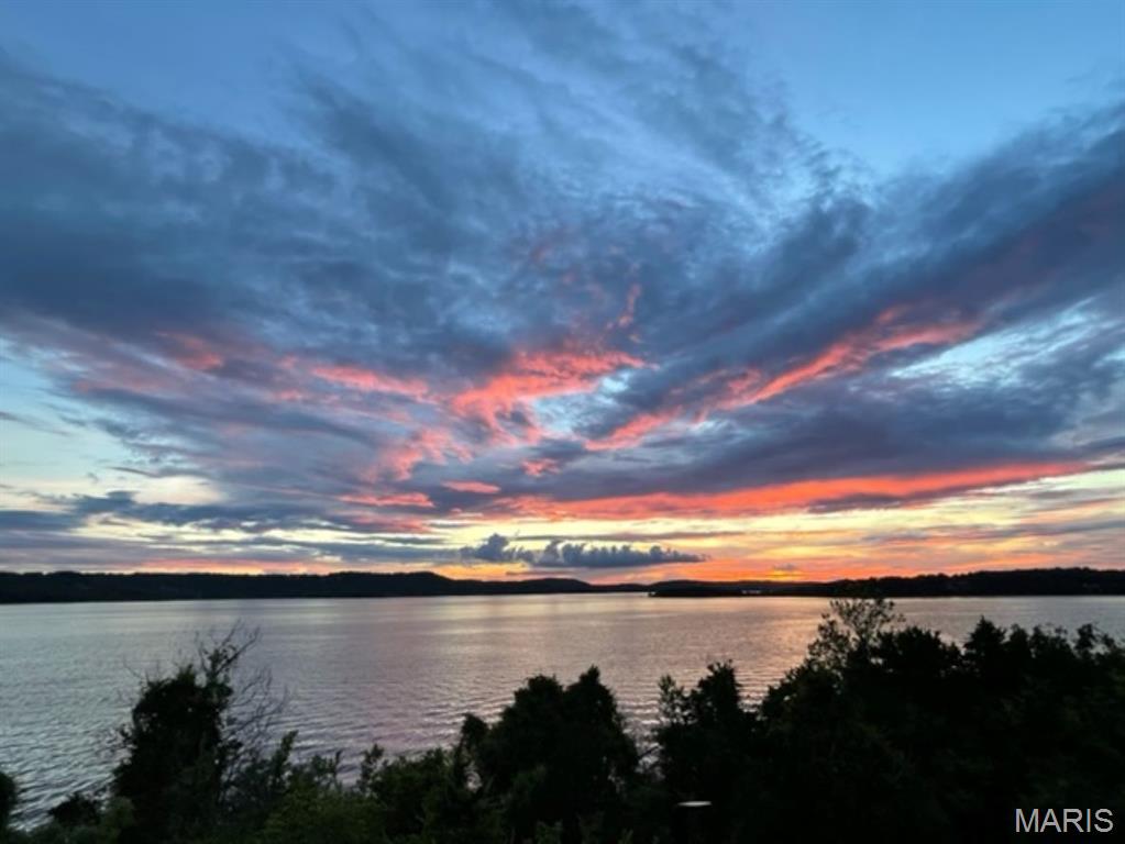 SPECTACULAR SUNSETS & PANORAMIC LAKE VIEWS, LAKE FRONT 3 BEDROOM NIGHTLY RENTAL APPROVED CONDO!!! Welcome to Luxury Lake Front Living at Lake Harbour in Emerald Pointe. Tastefully Updated & Furnished. New HVAC. Unit is Active, Turn Key Nightly Rental with Great Rental History, Being Sold Fully Furnished. Perfect for Full Time Living, Vacation Home and/or Investment. Lake Harbour is a Small Building, Only 16 Units, w It's Own Salt Water Pool, So Never a Crowding Issue. Walk Out Your Door and You are Steps from the Shore, Where You Can Walk the Shoreline Forever, Swim at the Gravel Beach & Fish. You'll Always Want to be Home For Sunset, As Every Evening You are in for a Real Treat! Spot Eagles, Herons & a Variety of Waterfowl & Birds from Your Balcony. Emerald Pointe is a Wonderful Gated Community w Quick Highway Access, Short Drive to Shopping, Dining, Attractions, Medical, etc. Community Features Clubhouse, Pool, Pickleball/Basketball/Tennis Courts, Fitness Room, Marina w High & Dry Storage, Courtesy Dock, Boat Ramp, Secure/Gated Storage & Lake Front Access. Begin Living Your Best Lake Life Today!