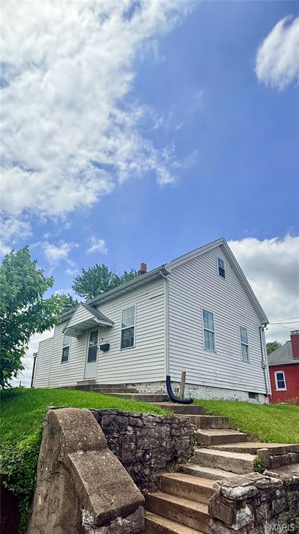 Charming 2 bedroom, 1 bath bungalow featuring numerous recent improvements and a spacious deep lot with rear parking. Plenty of room for outdoor entertaining, pets, gardening, or future garage potential. Affordable opportunity with tons of potential for the next owner. Property being sold as-is.