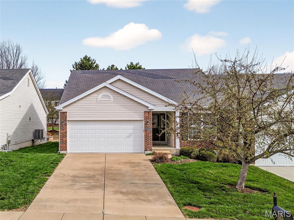 Impressive 2 bedroom (plus an Office), 2.5 bathroom villa in an excellent St. Charles location. Enjoy low maintenance living in this well-maintained villa with approximately 2,114 sq ft of open, smart living space. The exterior has brick, vinyl siding, enclosed fascia/soffits, leaded glass front door, two car garage and a patio for outdoor enjoyment.  This lovely neighborhood has sidewalks on both sides of the street and the mail is delivered to your home. Features include vaulted ceilings in the Entry-Great Room-Dining area-Kitchen-Breakfast Room, hardwood floors in the Entry-Kitchen-Breakfast Room, 42 inch cabinets with crown, tile backsplash, stainless steel appl, granite countertops, refrigerator, main floor laundry, recessed lighting, pendant lights, gas FP, a Den/Office with glass French doors, coffered ceiling and bay window in the Primary Suite, walk in closet with organizers, ceiling fans, raised height double bowl vanity in the Primary Bath, corner soaking tub, shower with bench seat, 50 gallon water heater and more. The finished lower level has a large Family/Recreation area, an egress window and a half bath.  A low monthly fee covers lawn and landscape care, snow removal (per indentures) and trash removal.  This excellent location is near the many shops and restaurants on historic Main Street, the Katy Trail, beautiful parks and the popular Streets of St. Charles Entertainment District. Lambert International airport is an easy commute. There is easy access to Hwys 70, 94 and 394. Beautiful home, outstanding location, so much to love!
