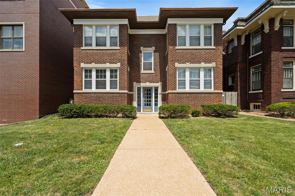 Poised in one of Clayton's most coveted enclaves, this impeccably maintained multi-family residence presents a rare opportunity to own and live in a timeless property in the heart of the vibrant Hi-Pointe/DeMun neighborhood. Here, every day begins with a leisurely walk to neighborhood favorites including Sasha's, Louie's, and Clementine's, where charming cafés, acclaimed dining, and a true sense of community create an unmistakable neighborhood spirit. Gracefully blending classic architectural character with thoughtful modern updates, each residence is filled with warmth and natural light, showcasing gleaming hardwood floors, spacious rooms, and timeless finishes throughout. The property offers three beautifully maintained residences, including two one-bedroom, one-bath apartments with shared lower-level laundry, and an exceptional owner's residence featuring three bedrooms, two baths, a private in-unit laundry room, and an inviting deck overlooking the peaceful, tree-lined backyard. A private carport further enhances everyday convenience for the residents. 
Perfectly positioned directly across from St. Mary's Hospital and just moments from Forest Park, this remarkable property places world-class recreation, museums, the Saint Louis Zoo, golf, and miles of picturesque trails at your doorstep. Washington University, premier medical centers, and the region's most celebrated cultural destinations are all within easy reach. Meticulously cared for, the property has been enhanced with newer HVAC systems, updated electrical service, newer water heaters, and a roof replaced in 2019—providing confidence as well as enduring value. Adding yet another layer of distinction, the property is zoned Live/Work, offering exceptional flexibility for an owner-occupant, entrepreneur, or investor seeking both lifestyle and long-term opportunity. Enduring, and exceptionally located, this is more than an investment—it's an invitation to become part of one of St. Louis' most cherished neighborhoods, where historic charm, walkable conveniences, and vibrant city living exist in perfect harmony.