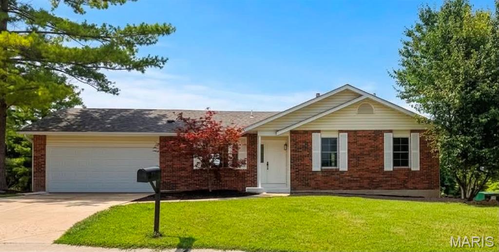 Beautifully renovated 3 bedroom, 2 bath ranch in the Orchard Farm School District. Features new flooring throughout, newer windows, and an recently updated roof and mechanical systems — truly move-in ready. The open-concept main level showcases a kitchen with 42” cabinets, stainless steel appliances, and granite countertops. Living room centers on a beautifully tiled fireplace. Bright walk-out basement adds flexible living space with easy yard access. Outside offers a 2-car garage and a big, beautiful backyard. Located right across the street from Fox Hill Park — perfect for outdoor activities and family fun.