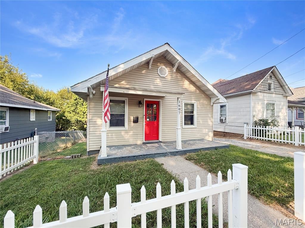 Completely remodeled in 2023 and move-in ready! This charming 2-bedroom, 1-bath bungalow features updated flooring throughout, a remodeled kitchen with stainless steel appliances and plenty of cabinet space, an updated bathroom, new HVAC, and more. The living area flows into the kitchen and dining space, creating a comfortable and functional layout. Outside, enjoy a back deck overlooking the spacious fenced backyard with mature shade trees. An unfinished basement provides plenty of additional storage space. The roof was replaced in 2021, adding another major update to the list. Updated, well-maintained, and full of charm, this bungalow is ready to welcome its new owners!