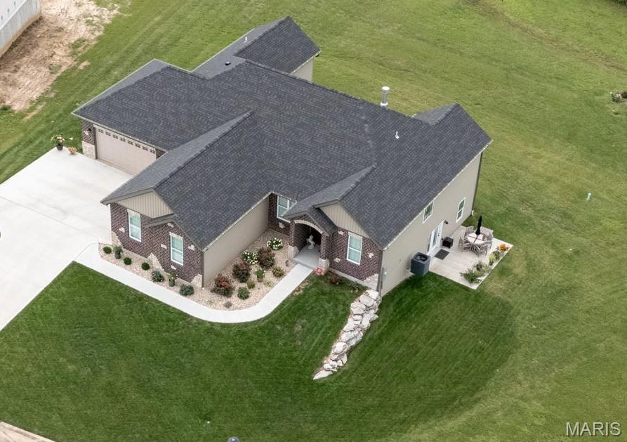 New home (1Year) with several improvements & impeccably maintained. This home boasts quality finishes and is beautifully manicured. You truly must step inside to appreciate everything it has to offer! HIGH SPEED INTERNET,  Gateway fiber hardwired into home with up to 2Gbps possible, 4 CAR GARAGE, ranch custom home on 0.62-acre lot in the desirable Westborough Estates Subdivision. Featuring approximately 3,900 square feet of total living space, this home includes 4 BR, 3.5 bathrooms, & oversized 4-car attached garage (insulated & polyaspartic floors). Overall attic R value 49, security cameras included. The finished walkout LL includes a large wet bar, 4th BR/5th possible, & full bath. Elegant touches include hardwood flooring throughout, plantation shutters, 9-foot ceilings, vaulted/coffered accents, & a striking stone gas/wood-burning fireplace w/built-in bookcases. The luxury kitchen features custom cabinets, quartz & granite countertops, a tile backsplash, & stainless steel appliances. The spacious master suite offers a luxurious bath w/double vanity, separate tub, tiled shower, large walk-in closet/organizer/center island. Outdoor spaces include a 20' x 14' composite deck & 18' x 12' patio, perfect for relaxation/entertaining. Oversize mud room plus bonus room for pets/shoes/coats etc. Beautiful, well done home, Seller relocating closer to family and for medical needs. Sellers will miss the neighborhood.