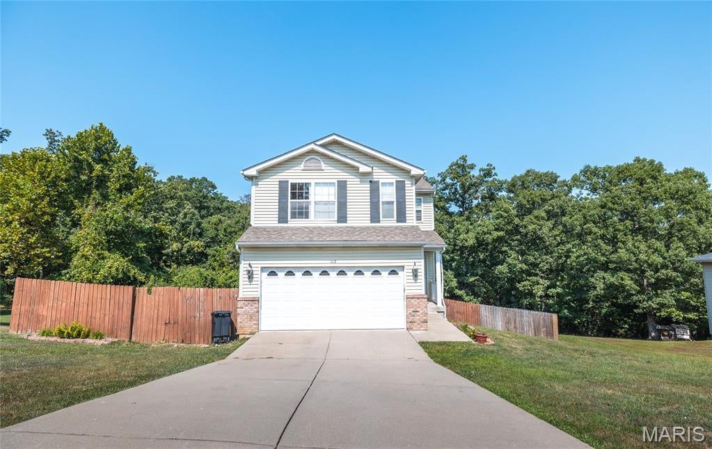 Welcome to this spacious 4-bedroom, 2.5-bath home nestled in one of St. Robert's most desirable subdivisions, where comfort, convenience, and everyday living come together. Ideally located just minutes from the main gate of Fort Leonard Wood, this home is also close to schools, shopping, restaurants, and all the amenities that make life easier.

Inside, you'll find a warm and inviting layout designed for both relaxing and entertaining. Brand-new luxury vinyl plank flooring throughout the upper level adds a fresh, modern touch while offering durability for busy households. The finished basement provides even more room to spread out, featuring a spacious family room that's perfect for movie nights, a home office, playroom, or game room. With direct access to the backyard, it's easy to enjoy both indoor and outdoor living.

Step outside to your own private retreat featuring a deck and patio overlooking a fully fenced backyard. Whether you're hosting summer barbecues, letting kids and pets play freely, or simply unwinding after a long day, this outdoor space offers endless possibilities. For those dreaming of a hobby homestead, you'll love the ready-to-use chicken run, already in place and waiting for your feathered friends, adding a unique touch to this versatile property.

Offering generous living space, thoughtful updates, and an unbeatable location near Fort Leonard Wood, this move-in-ready home is one you won't want to miss. Schedule your private showing today and discover why this St. Robert gem is the perfect place to call home!
