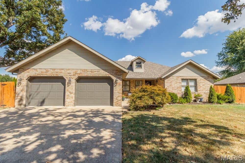 TAKE A LOOK AT THIS ALL BRICK HOME IN THE SOUGHT AFTER SOUTH LAWN ESTATES !!  THIS  4 BEDROOMS, 2 BATH home with over 2,000 sq ft of LIVING SPACE.  A  VERY WELL MAINTAINED and  CLEAN HOME OFFERS THAT OFFERS A LARGE OPEN LIVING ROOM with FRENCH DOORS that allows   ACCESS TO YOUR LARGE REAR DECK, and  A PRIVACY FENCED YARD that BACKS TO a WOODED AREA.   THE  SPLIT BEDROOM PLAN, RECESSED CEILINGS, A GREAT MASTER BEDROOM and BATH with. A WALK IN SHOWER  with  A TILE SURROUND.    LARGE CLOSETS  and  GREAT STORAGE AREAS. VERY LARGE LAUNDRY ROOM with A LOT OF CABINETRY 
LOCATED ON THE SOUTH SIDE OF TOWN OFFERING EASY ACCESS TO 1-44  and ALL THE SHOPPING AREAS  

MAKE YOUR APPOINTMENT TODAY !!.