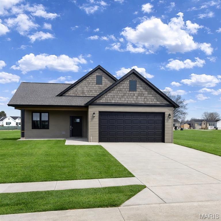 Welcome to The Birchwood, a beautifully designed new construction home offering 3 bedrooms, 2 full baths, and 1,325 sq ft of thoughtfully planned living space with a 2-car garage. This open-concept layout features a vaulted great room and vaulted primary bedroom, creating a bright and spacious feel. The kitchen is finished with 42” custom cabinets with crown molding, granite countertops, an undermount or waterfall sink, installed cabinet pulls, stainless steel appliance package, and modern lighting. Luxury vinyl plank flooring runs through the main living areas, with upgraded carpet in the bedrooms.
The primary suite includes a walk-in closet and an ensuite bath with adult-height double vanities and granite countertops. Additional bedrooms feature mirrored closet doors. Enjoy outdoor living with a covered front porch, sliding door to the backyard, oversized driveway, and a 6’ white vinyl fenced backyard. The insulated and drywalled 2-car garage includes an opener with keypad. Located in the Hunter Oaks subdivision with walking trails, dog park, and common areas, all within walking distance to an elementary school, local restaurants, and a local gym