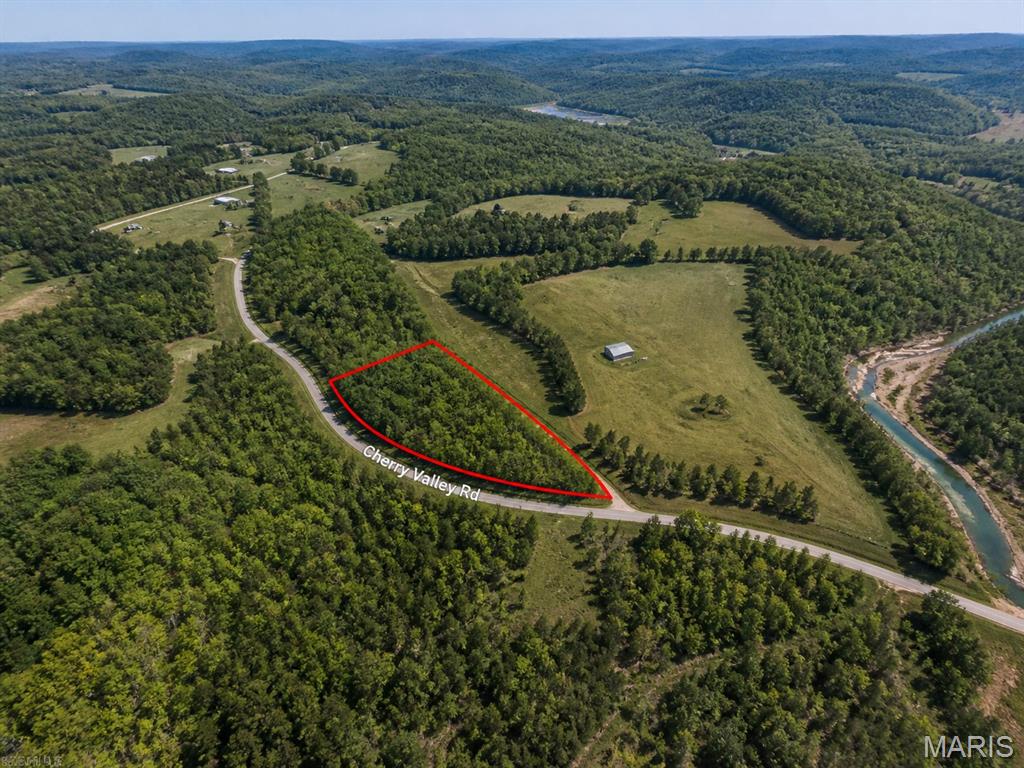 Great opportunity to own 2.5 acres of vacant land on Cherry Valley Road in Steelville, MO. This undeveloped parcel offers a blank canvas for your next build or investment project. With road access and a desirable location near Steelville and popular recreational areas, this property holds strong potential for future value. Build now or hold for later—opportunities like this don’t last long.