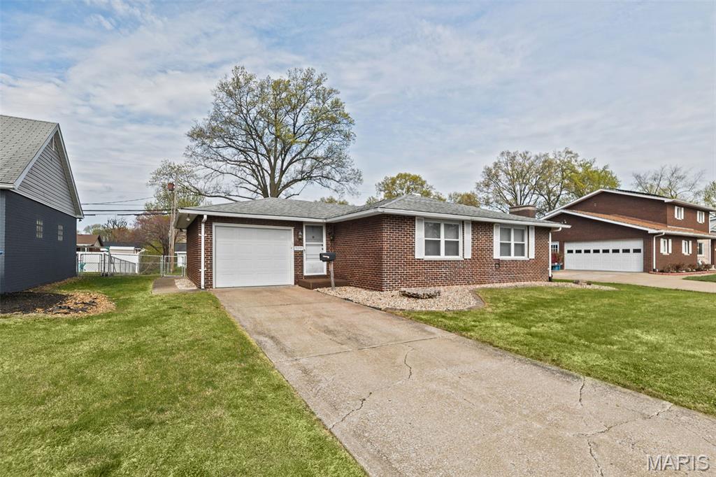Full Brick home with fenced back yard. 3 bed 1 1/2 bath home is ready for you to make it your own.  There is hardwood under some of the carpets but not sure all.  Windows have been replaced. Roof age is unknown. Primary bedroom has a 1/2 bath in it.  One car attached garage has a built in ramp for handicap access.  Crawl space entrance is in middle bedroom closet. Home is being sold in the as is condition.