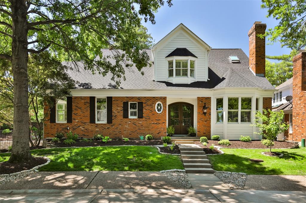 Absolutely spectacular remodel of charming one and a half story home in convenient location. Large entry with newly designed staircase leads to vaulted great room with gas fireplace and doors to screen porch. Casual dining area with new built-ins. Gourmet kitchen with cozy breakfast room. Large dining room flooded with natural light next to dry bar and powder room.  Primary wing includes awesome sitting room with gas fireplace, main floor laundry, spectacular bath, walk in closet and spacious bedroom. Upstairs includes office with 3rd gas fireplace, two bedrooms, two new baths and loads of storage space. Lower level with new media room, sauna, new full bath and 7 car garage! Other updates new siding, gutters, skylights, garage doors, exterior doors, hvac, wood floors, plantation shutters and more. Private backyard with lovely landscaping and large patio. Hurry this one won't last.