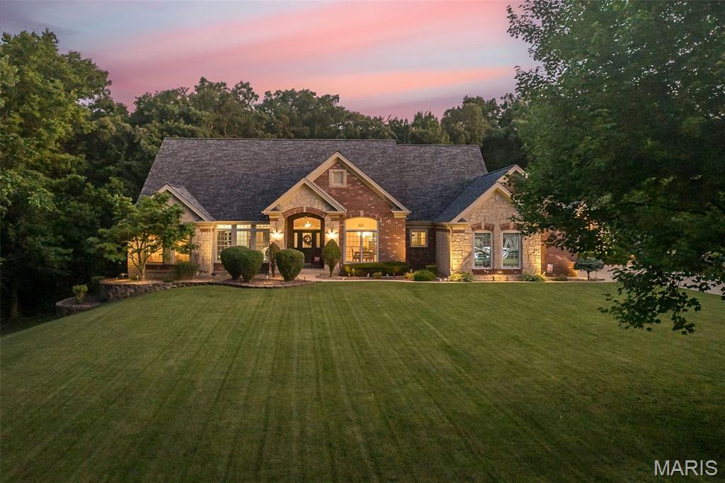 Award-winning custom home by Schneider nestled on 3 stunning acres with a resort-style POOL in prestigious Summit Estates! This exquisite atrium ranch features an open floor plan with elegant columns, marble fireplace, custom built-ins, and plumbing for a wet bar. The gourmet kitchen offers a large center island, gas cooktop, stainless appliances, and stylish backsplash, opening to a cozy hearth room with a striking stone fireplace. 
The spacious primary suite boasts French doors to a private deck (wired for a hot tub), his & her closets, and a coffered ceiling. Entertain with ease in the lower level featuring two bedrooms, a full bath, wet bar, generous living space, and huge game room. Step outside to your private backyard oasis complete with a sparkling pool, pool house, firepit, and beautifully manicured grounds. A 4-car garage leads to a functional mudroom with laundry sink, cabinetry, and a convenient half bath for pool guests. Irrigation, fresh paint, professional landscaping, and brick mailbox complete this one-of-a-kind estate.

Luxury. Privacy. Lifestyle. Welcome Home