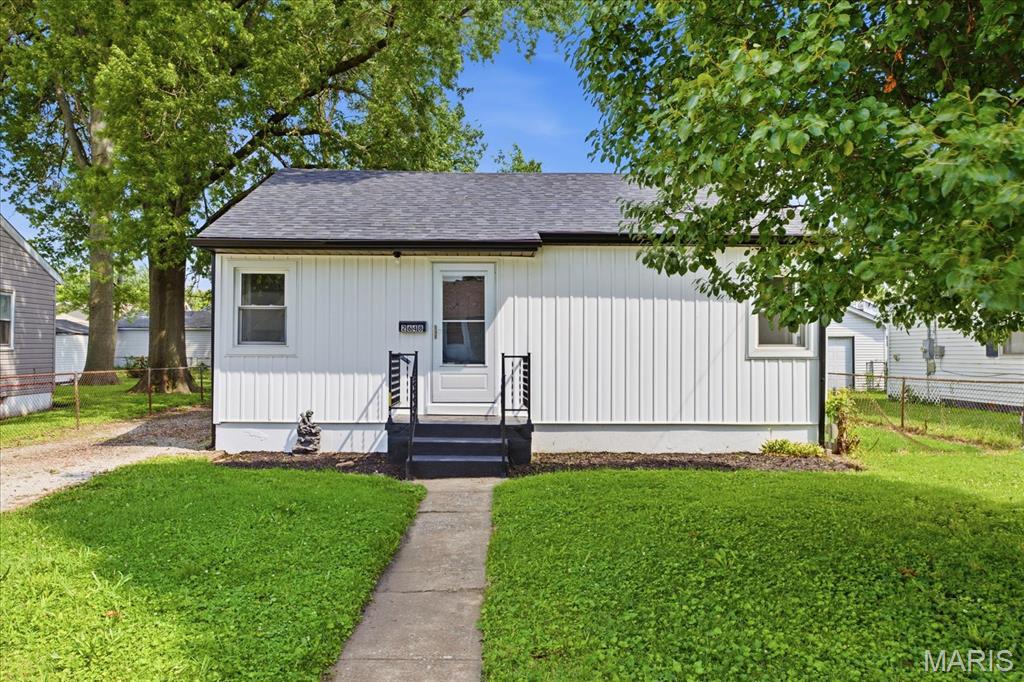 Completely updated and move-in ready! This charming 2-bedroom, 1-bath home features numerous recent improvements, including a new roof and new siding for added peace of mind. Inside, you'll find luxury plank flooring throughout, fresh paint, updated lighting, and beautiful renovated bathroom with modern finishes. The detached garage provides additional storage and parking, while the home's stylish updates make it the perfect blend of comfort and convenience. Ideally located just one block from Wilson Park, you'll enjoy easy access to green space, walking paths, and recreation. Plus, you're just minutes from shopping, restaurants, and other everyday conveniences. Whether you're a first-time homebuyer, looking to downsize, or searching for an investment property, this home is one you won't want to miss. Schedule your showing today! Agent Owned