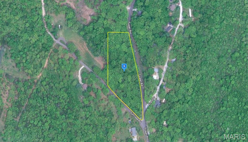 Discover this 3.25-acre residential corner lot in the Hillsboro area of Jefferson County. Featuring rolling, wooded terrain, the property offers a scenic and natural setting with a balance of privacy and usable land. Located in a quiet area with no HOA restrictions, it provides flexibility for a future home while still maintaining convenient access to nearby major highways, shopping, dining, schools, and essential services. The Hillsboro region is known for its rural landscapes, established residential communities, and easy connectivity to surrounding cities, making it an attractive location for a future build or long-term investment. Street addresses can be for listing purposes only and vacant land will receive a true street address once improved.