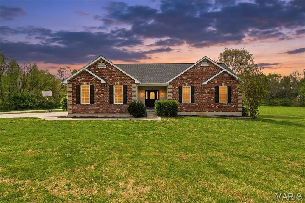 Welcome to your private slice of country living! Nestled on 3 beautiful acres, this spacious 4-bedroom home offers approximately 5,500 sq ft of comfortable living space, perfectly blending functionality with natural charm.
**Flood zone certification in supplements. Home is not in the flood zone **
Step inside to find a warm and inviting main level featuring around 3,100 sq ft, highlighted by a cozy fireplace—ideal for relaxing evenings or gathering with family and friends. The layout provides ample room for both everyday living and entertaining.

The home boasts a huge primary (master) bedroom, offering a true retreat with plenty of space for a sitting area or additional furnishings. Enjoy the convenience of a private en-suite bathroom, creating a comfortable and secluded space to unwind.

The mostly finished basement adds an additional 2,500 sq ft of versatile space, perfect for a family room, home office, gym, or recreation area. Whether you need extra room to spread out or a dedicated space for hobbies, this lower level offers endless possibilities.

Outside, take in peaceful views from the deck overlooking the property, where a picturesque wet-weather creek enhances the serene setting. The 3-acre lot provides plenty of space for outdoor activities, gardening, or simply enjoying the privacy of nature.

A detached garage with a durable concrete floor offers excellent storage and workspace for vehicles, tools, or projects.

With generous square footage, both indoors and out, this property delivers the tranquility of rural living while still providing all the comforts of home. Don’t miss your chance to own this versatile and inviting property!