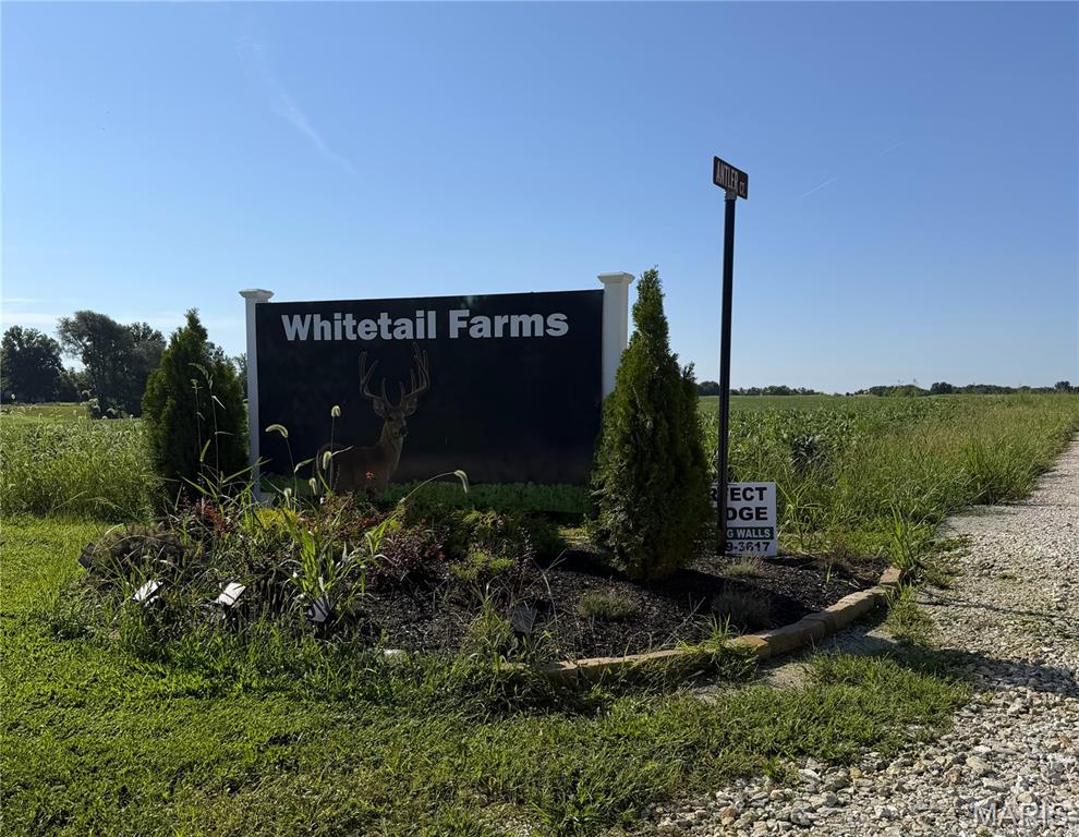 Welcome to Lot 6 of Whitetail Farms! Located near the intersection of Hwy A and Josephville Rd, this beautiful 3-acre homesite offers peaceful country living while still providing easy access to Hwy 70 and 40/61. Bring your vision and choose your preferred builder to create a custom home that fits your lifestyle. Building requirements include a minimum of 1,400sqft. for one-story homes, and 2,200sqft. for 1.5-story and two-story homes. Additional restrictions in place to protect your property values; contact listing agent for full details. This is the ONLY lot remaining in this 10-lot development! Don't miss your opportunity to secure a spacious homesite offering privacy, convenience, and room to build the home you've been dreaming of.