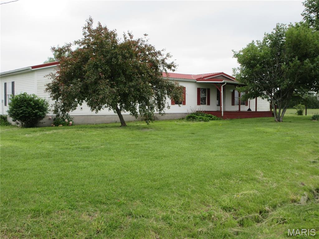 **Selling As-Is**
Spacious 4-bedroom, 2-bath home situated on approximately 3 acres in a rural setting outside of Iuka. Property features a large pole barn with a 2-car garage area, as well as an additional storage shed offering plenty of space for equipment, vehicles, or workshop use. Home offers great potential but will require repairs and updates to become fully livable. Property currently does not have running water. Selling AS-IS with seller to make no repairs or inspections. Possible owner financing available. Great opportunity for investors, renovators, or buyers looking for acreage with outbuildings and room to improve.
**Broker Owned**