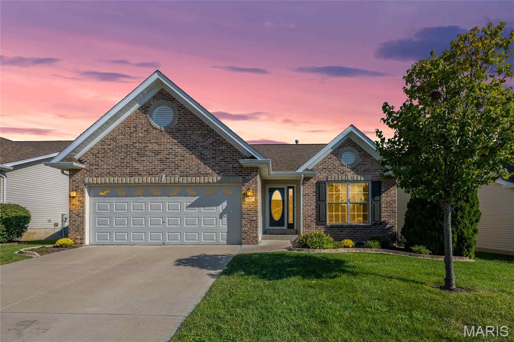 Stunning detached TR Hughes villa located in the Villas at Crystal Ridge in O Fallon! This home boasts 3 bedrooms, 3 bathrooms, and over 2,200 square feet of living space including a finished lower level.

Entry foyer with gleaming hardwood floor opens to the spacious living room with a vaulted ceiling. The kitchen boasts a new stove (2025), tile backsplash, pantry, dining area, and a sliding glass door to the back deck.

The primary bedroom features a ceiling fan, newer hardwood floors, a walk-in closet, and the primary bathroom. The bathroom features a shower with a bench and a linen closet. An additional bedroom, full hall bathroom, and the laundry room with a utility sink complete the main level.

The finished, lookout lower level boasts a huge recreation room, multiple finished storage rooms, a full bathroom, 3rd bedroom with a ceiling fan, and ample storage space with attached shelving, a utility sink, and workshop area.

Other highlights include: 2 car garage with a new water softener (2024), freshly repainted interior (2026), new carpeting throughout most of the home (2026), new water heater (2020), newer storm door, and a new brick landscaping border (2025).

Relax outside on the partially covered back deck that was repainted in 2026 and enjoy the backyard! Location could not be better - close to major highways, restaurants, shops, and schools!