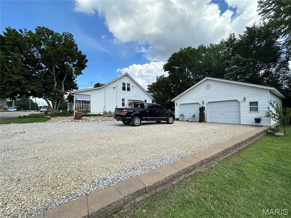 Updated Charm, Spacious Living & Outdoor Appeal!
Welcome home to this beautifully updated 3-bedroom, 2-full-bath story-and-a-half home that perfectly blends comfort, style, and functionality. The spacious primary suite occupies the entire upper level, creating a private retreat complete with a walk-in closet, relaxing jetted tub, separate shower, and dual his-and-her vanities.
The main level features an inviting open-concept design with a spacious living area, well-appointed kitchen, and convenient pantry, making everyday living and entertaining a breeze. Step outside and fall in love with the stunning flower gardens, fenced backyard, and abundant outdoor living spaces. The detached shop provides excellent storage or workspace, while the additional hangout area offers the perfect setting for a man cave, hobby room, or entertaining family and friends.
Situated on a desirable corner lot, this property offers curb appeal, character, and plenty of room to enjoy both inside and out. This one is truly a must-see!