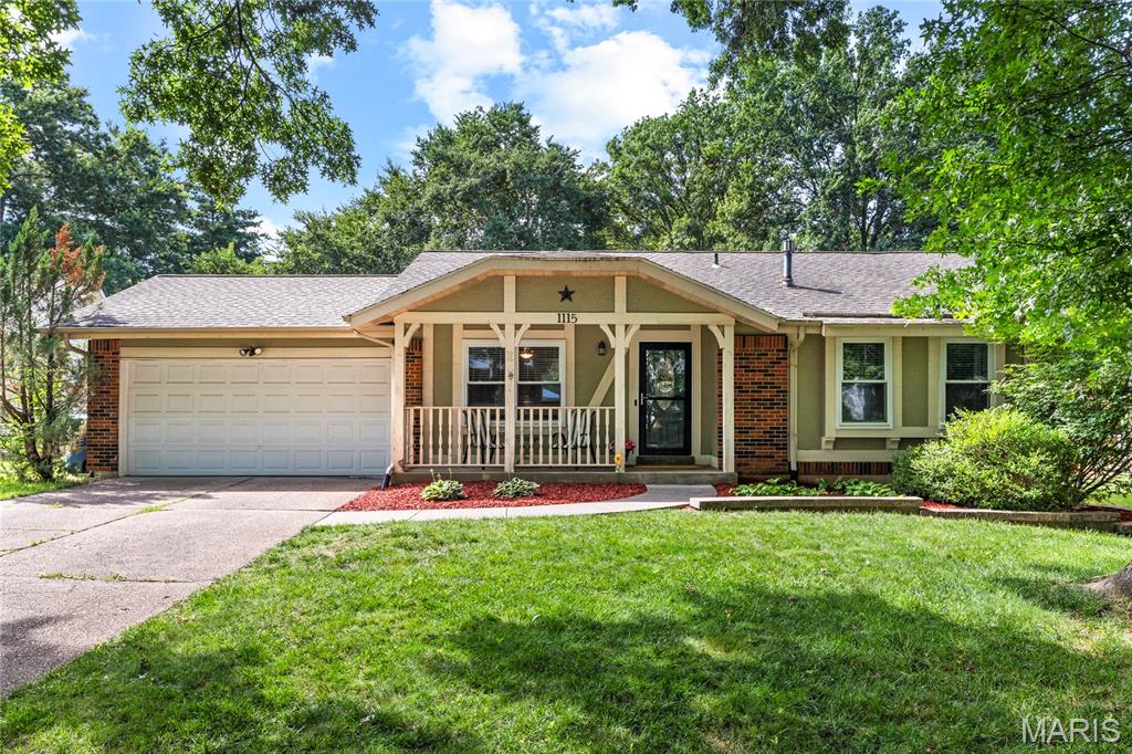 Beautifully maintained and thoughtfully updated, this inviting ranch offers the perfect combination of comfortable living, flexible space, and an exceptional location. From the welcoming covered front porch to the open floor plan, expansive finished lower level and private, fully fenced backyard, every space has been designed for effortless everyday living and entertaining. Rich hardwood floors flow throughout the main living areas, creating warmth and continuity from room to room. The spacious family room opens seamlessly to the beautifully updated kitchen, where custom maple cabinetry, granite countertops, stainless steel appliances, a subway tile backsplash, pantry storage, and a center island create the true heart of the home. Just beyond, the dining room is anchored by a cozy gas fireplace and offers direct access to the patio, creating an effortless connection between indoor and outdoor living that’s perfect for everything from quiet evenings at home to gatherings with family and friends. Privately situated, the primary suite offers a spacious walk-in closet and an updated ensuite bath featuring a walk-in shower. Two additional bedrooms and an updated hall bath provide comfortable accommodations for family, guests, or a dedicated home office. The finished lower level dramatically expands the home’s living space with a large recreation room, custom dry bar, full bath, versatile bonus room, and abundant storage. Whether you’re hosting game day, working from home, or simply looking for extra room to spread out, this level offers endless possibilities. Step outside and discover a backyard designed to be enjoyed. The expansive patio provides the perfect setting for grilling, outdoor dining, or relaxing under the shade of mature trees, while the fully fenced yard offers generous green space for pets, play, or simply enjoying the outdoors. Ideally located within the coveted Oak Brook Elementary boundaries and the award-winning AAA Parkway School District, this home offers exceptional convenience to parks, shopping, dining, and major highways. Beautifully maintained inside and out, this is a home that truly checks all the boxes.