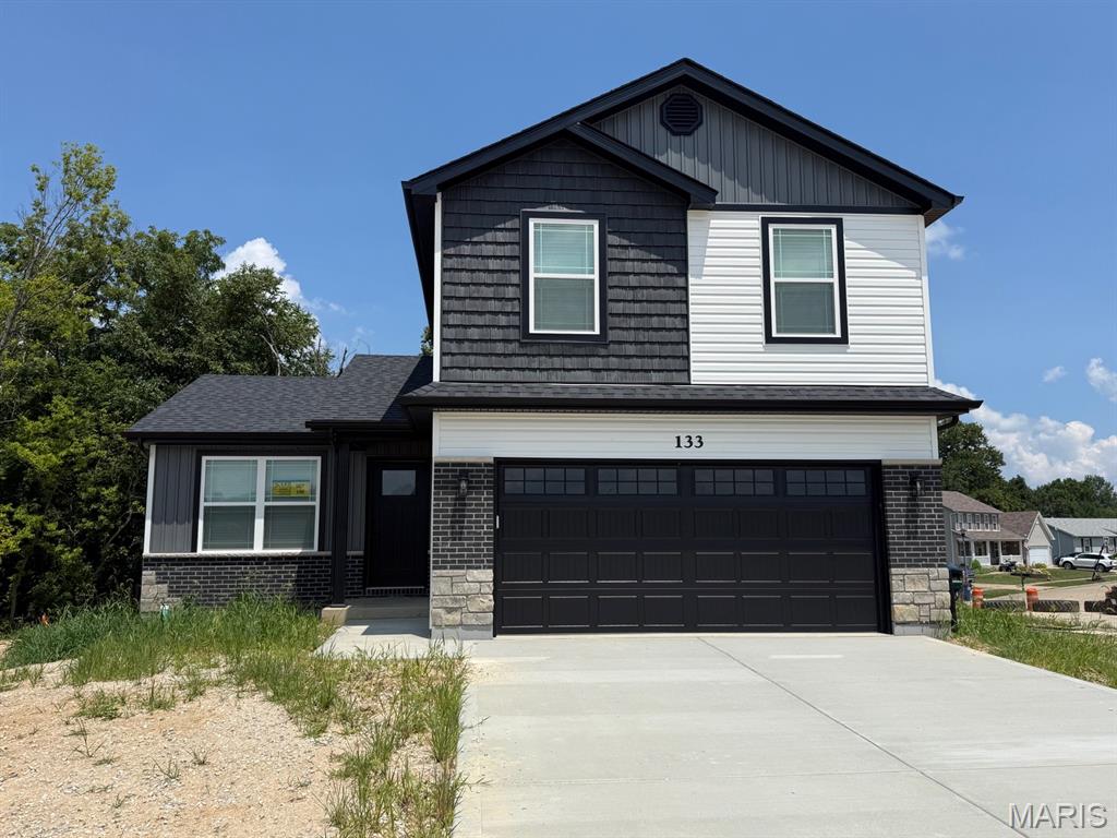 BRAND NEW home with every option you could imagine! They include vaulted ceilings, rounded “bullnose” corners, granite or quartz countertops, stainless steel appliances (including fridge!), 42" cabinets with "cushion close", custom neutral-colored paint job throughout, LVT flooring throughout most of the home, framed windows, taller baseboards, adult-sized cabinets in bathrooms with marble countertops, walk-in closets, upgraded carriage garage doors with openers on 2  CAR Garage, full bath rough-in, panel doors, and upgraded water/light fixtures throughout the house! Second FLOOR laundry! Fully sodded yard (front/sides/back when weather permits).