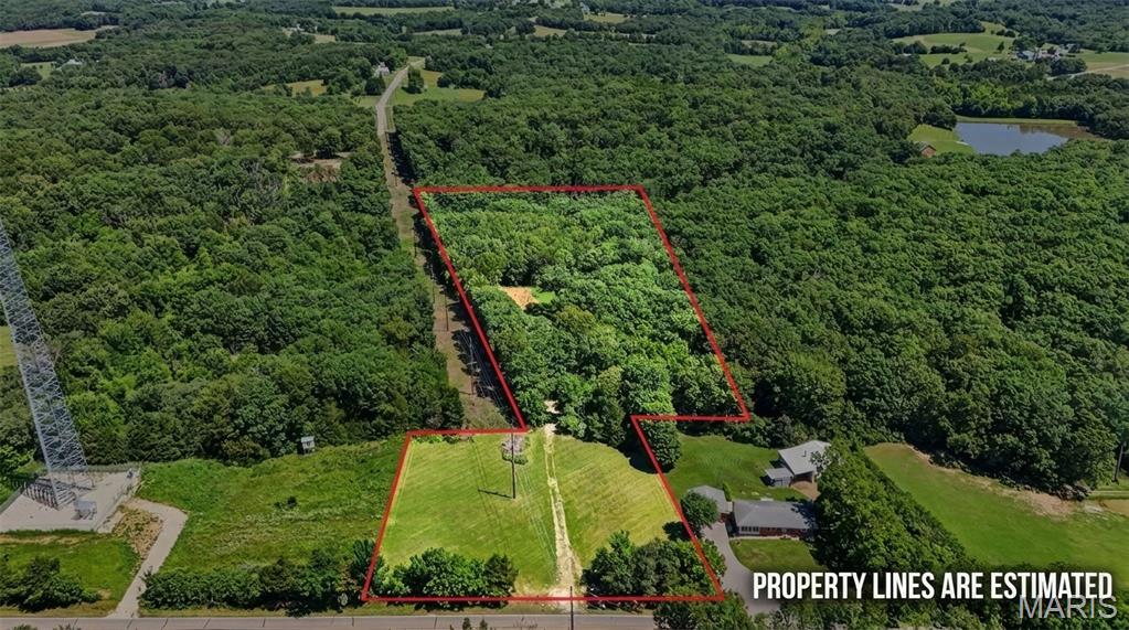 Looking for the perfect place to put down roots? This 5.94 +/- acre tract offers the rare combination of privacy, convenience, and freedom. Located in the highly sought-after Franklin County R-II School District and just minutes from town, this mostly wooded property provides an ideal setting for your custom home. Bring your builder, your plans, and your vision! NO RESTRICTIONS! The groundwork has already been started with an existing driveway and a cleared area that could serve as a future homesite. Whether you're looking for a private homesite or recreational retreat, this property offers plenty of room to make it your own. Soil evaluation test results are available upon request.