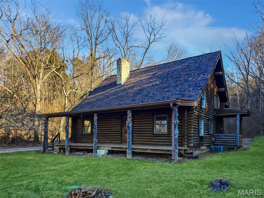 Tucked away on 3.5 acres, this 3-bedroom, 2-bath log cabin offers a rare opportunity to create a truly special retreat. With its rustic charm and generous space, this home is ready to be transformed into the perfect getaway or full-time residence. Endless potential awaits.