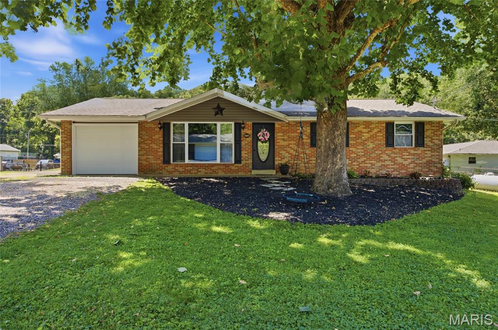 Welcome home! This beautifully maintained, turnkey home is ready to impress. Featuring tons of updates, including newer (2017) roof, gutters, siding, soffits, windows, HVAC and remodeled kitchen and bathrooms with new cabinetry and appliances!!!  This property combines modern comfort with effortless, everyday living. In the kitchen you’ll find upgraded cabinetry with beautiful granite countertops, and stainless steel appliances. This home features laminate and hardwood flooring throughout and fresh neutral paint, along with newly updated bathrooms. Downstairs you’ll find an additional living area with double sided fireplace that leads into a bonus room! Step outside onto the gorgeous patio to enjoy summer nights and bbq with friends. Don’t miss out on this amazing home! Book your appointment today!
