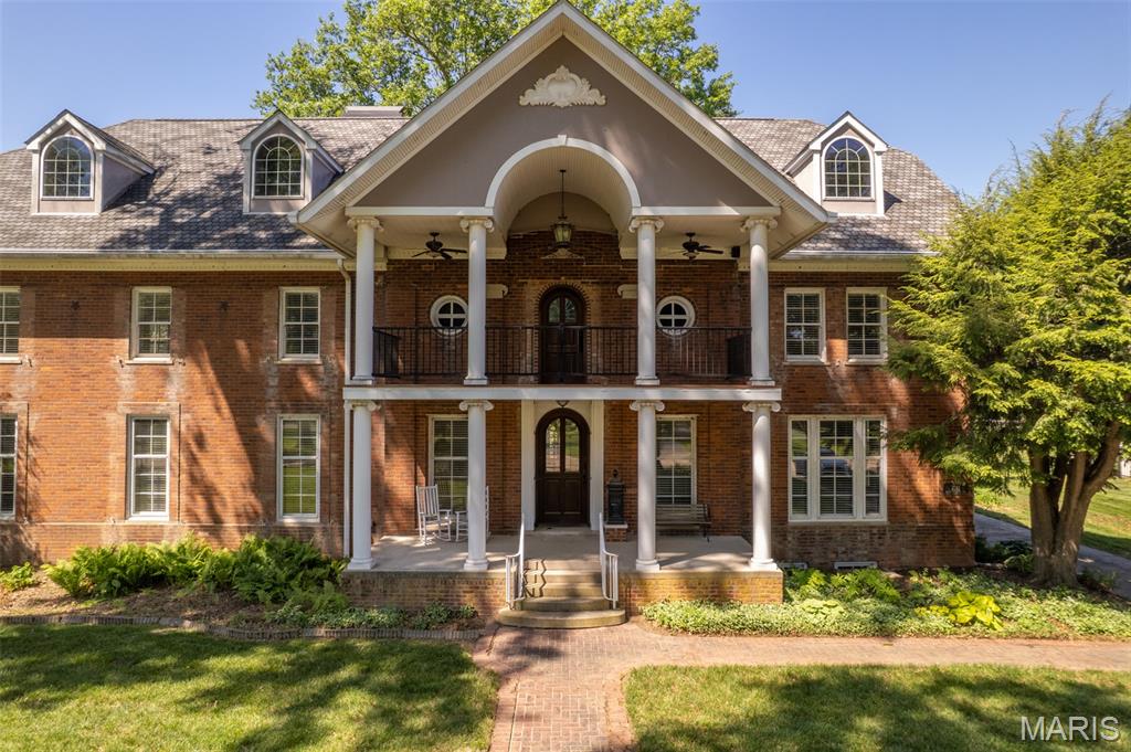 What a gorgeous, well maintained historic home!  Let’s start with the kitchen.  It’s the chef’s kiss!  The kitchen appliances are top-of-the-line Frigidaire Professional Series 5.  The gas stove has five burners plus a pot filler above it.  The cabinets are custom with granite tops and copper sinks, plus there is a Butler’s pantry for extra room.  A mud room just inside the back door keeps coats and backpacks out of sight and is super convenient.  As you tour this home, the rich wood tones stand out and the wood is in incredible condition.  The front door is solid wood with custom arch.  Exquisite crown molding throughout, and the rooms are large with tall ceilings and a lot of natural light.  There are 5 fireplaces to accent there multiple rooms for dining and entertaining, and every detail has been considered.  The walk-up basement has 2 bonus rooms, bar area, storage and laundry.  The detached garage has enough room for 3 cars.  There are 2 lots for 1.4 acres of ground.  WOW!  Yes, you need to take a look!