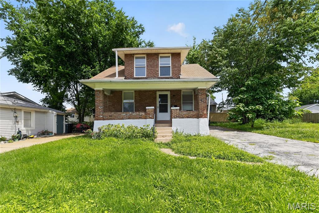 Discover the charm of this 1.5-story bungalow situated on a rare, spacious 100' x 100' double lot in the heart of Kirkwood’s desirable Meacham Park neighborhood. This 4-bedroom home offers a versatile layout, featuring cozy main-level living spaces and hardwood floors. The property includes a large backyard with a deck, perfect for outdoor entertaining or gardening. Enjoy the convenience of being close to Kirkwood’s vibrant downtown shops, dining, and parks.