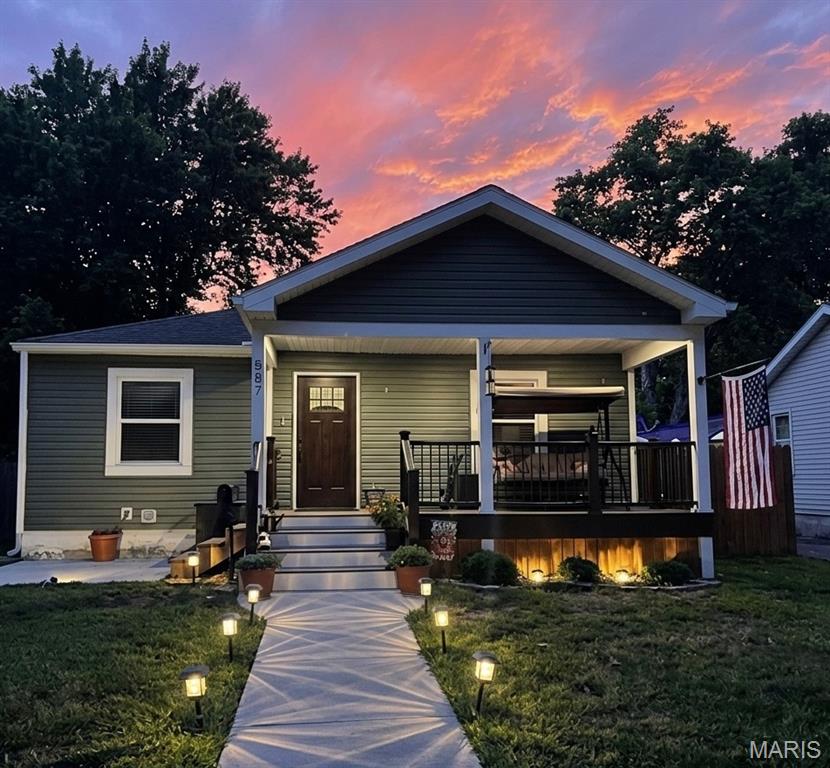 Completely move-in ready 3 bedroom, 2 bathroom home located in the desirable Roxana School District! The main level was fully remodeled in 2020 and features an updated kitchen with stainless steel appliances, tile backsplash, and recently added French door refrigerator. The beautifully updated main floor bathroom offers a tiled shower surround for a clean, stylish look. The newly finished basement, completed in 2024, adds valuable living space with a family room, spacious bedroom with large walk in closet and egress window, plus a half bath/laundry combo. This home has been extensively updated inside and out, including: 8x20 covered front porch with Trex decking, sidewalk and patio, cedar-tone 6-foot privacy fence, 12x18 portable shed, front door and storm door, back door, gutters, sewer lateral, egress window, copper water lines, new Romex electrical wiring, perimeter waterproofing and sump pump, basement windows. Roof was 2020. This home offers peace of mind with major mechanical and structural improvements already completed, making it truly turnkey and ready for its next owner!