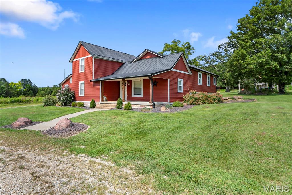 Enjoy country living on just over 7 scenic acres with this beautifully updated 3-bedroom, 2-bath home offering 2,193 square feet of living space. Built in 1910, this home blends farmhouse character with thoughtful updates and plenty of room both inside and out.

The custom kitchen is a standout, featuring beautiful hickory cabinetry, generous counter space, a large island, and stainless steel appliances. Hardwood floors run throughout much of the main living space, and main-floor laundry adds everyday convenience. The spacious primary suite features an impressive custom bathroom with dual vanities, a soaking tub, separate tiled shower, and plenty of room to unwind. Just off the primary bedroom is a dedicated office, perfect for working from home or a quiet flex space.

Outside is where this property really shines. Nearly all of the 7+ acres is open pasture, with portions already fenced and beautiful country views in every direction. Relax on the inviting front porch, enjoy the back patio, or spend summer days around the above-ground pool and deck. With plenty of usable ground and room for animals, gardens, or other hobbies, this property has all the makings of a great mini farm or simply a peaceful place to call home.