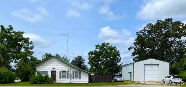 CAST A LINE & COME HOME TO COUNTRY LIVING! Looking for an affordable Missouri home w/ room for the boat, RV & all your outdoor toys? This 1,024 SF, 2 BR/1 BA home is centrally located to Lake of the Ozarks, Pomme de Terre Lake, Truman Lake & Stockton Lake—putting some of Missouri’s favorite FISHING & RECREATION destinations within reach! Enjoy convenient main-floor living & quick access to highway routes toward Buffalo, Preston, Springfield & the Lake area. Inside, the spacious kitchen features abundant counter space, eat-in dining & flows into a comfortable multi-use living room. Bedrooms are positioned on opposite ends of the home for added privacy, with a centrally located bath & bright laundry area offering additional storage. The enclosed porch adds flexible bonus space. The real catch is the impressive 30x50x16 SHOP—ideal for RV & boat storage, collector cars, fishing gear, hobbies, workshop space or entertaining. Add a storage shed & manageable country setting, & you’ve found a great home base for work, weekends & life on the water. Bring the boat, bring the toys & make it yours!