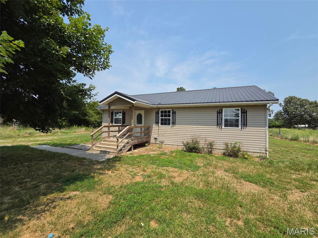 HIGHEST & BEST OFFERS DUE BY 1:00PM SEPTEMBER 3, 2026. Come take a look at this cute 3 bedroom, 2 bath home with a large detached garage sitting on 3 acres, offering lots of space to garden and create the yard you have been dreaming of!