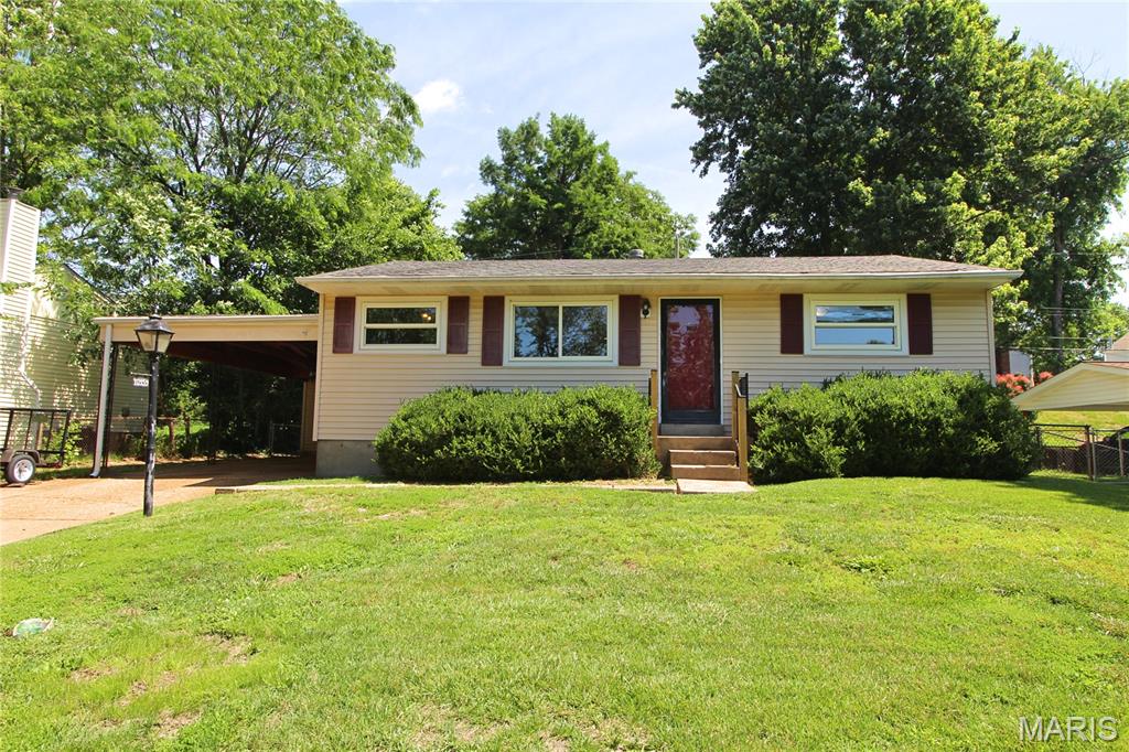 Welcome home to this delightful 2 bedroom, 1 bath ranch tucked into a wonderful Lindbergh School District location! From the moment you step inside, you'll appreciate the open-concept main living area, where the living and dining spaces flow together effortlessly over warm, wood floors, perfect for everyday living and easy entertaining alike.

The eat-in kitchen is full of charm and function, offering room to gather and a handy pantry tucked behind a stylish sliding barn door. A free-standing gas range adds to the kitchen's character and makes meal prep a breeze.

Just off the main living space, the sunroom invites you to relax with your morning coffee or unwind at the end of the day, no matter the season. Step outside to the fenced backyard, where a spacious patio sets the stage for summer barbecues, quiet evenings, or playtime.

Need storage? This home has you covered with a full unfinished basement offering tons of potential for storage, a workshop, or future finished living space, plus a 1 car carport with additional storage for all your extras.

With its inviting layout, charming details, and unbeatable location near schools, parks, and everyday conveniences, this home is ready to welcome its next owner. Schedule your showing today, this one won't last long!