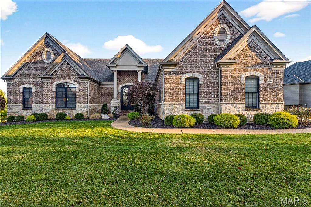 Stunning Atrium Ranch located in The Arbors at Kehrs Mill, showcasing thoughtful details and custom touches throughout! Set on a spacious ½-acre fenced lot, perfect for a future pool, this 5-bedroom, 5.5-bath home offers over 4,700 sq. ft. of finished living space. The exterior features an inviting blend of brick and stone. Inside, gleaming wood floors flow through the main living areas, leading to a light-filled great room with soaring windows, gas fireplace, built-ins, and an elegant iron-spindle staircase. A formal dining room with bay window adds timeless charm. The gourmet kitchen boasts custom cabinetry, stainless steel appliances, granite counters, a breakfast bar, and an adjoining breakfast room with bay window. A cozy hearth room with gas fireplace and triple French doors opens to a screened-in porch and deck, perfect for entertaining or unwinding. The primary suite offers a coffered ceiling with crown molding, a spa-inspired bath with dual vanities, jetted tub, a separate walk-in shower, and generous walk-in closets. Two additional bedrooms, 2.5 baths, and a laundry room complete the main level. The finished walkout lower level includes a spacious rec room, a custom walk-behind wet bar, two more bedrooms, and two full baths. Extras include a central vacuum system, 3-car side-entry garage, covered patio, irrigation system, and more!