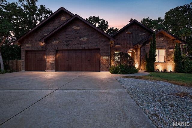 LUXURY, PRIVACY & PURPOSE-BUILT COMFORT ON 19+ ACRES! Tucked deep into a peaceful, wooded setting, this exceptional custom-built ranch offers the rare combination of seclusion, luxury, and functionality. Surrounded by nature and abundant wildlife, the property is ideal for hunting, entertaining, and enjoying privacy.  The main level features 3 bedrooms and 2 full baths, with 9' ceilings, upgraded millwork, trim, and hardware throughout. The open concept living space offers a spacious a cozy gas fireplace & the gourmet kitchen features 42" custom cabinetry, granite countertops, custom hood, and planning desk, creating a beautiful and functional space for everyday living and entertaining.  The private primary suite offers direct access to the outdoor patio and features a luxury bath with garden tub, separate walk-in shower with custom marble surround, bidet, and dual vanities.  One of the home's most inviting spaces is the private sunroom, surrounded by screens and doors, creating the perfect retreat for morning coffee, quiet evenings, or watching the wildlife just outside your door.  The completely finished lower level adds incredible living and entertaining space and features brand-new flooring and 9' ceilings. You'll find a 4th bedroom/sleeping room, wet bar entertaining area with refrigerator and beverage fridge, spacious living room with a second gas fireplace, wine/sitting room, and full bath with custom walk-in shower. Then there's the media room like no other! The home theater system stays, including the 110" screen and Sony 4K projector, making this the ultimate space for movie nights, game days, and entertaining.
For added security and peace of mind, the lower level includes a true safe room with steel safe door and built in combination lock. The room features 8" concrete walls and ceiling, LED lighting, laminate flooring, and built-in cabinets with countertops. The insulated & drywalled finished 3-car garage offers 8' tall overhead doors, abundant storage, and multiple closet spaces. An additional 14' x 8' finished tractor garage is located on the side of the home with a 6' insulated Overhead door provides convenient space for equipment, lawn care, recreational toys, or additional storage. Outside, the property continues to deliver with a 32' x 24' outbuilding with electric run to the building (not currently connected), plus an additional 15' x 7' storage shed. Additional updates and features include a new water heater in 2026, roof replaced in 2021, water softener that stays, and propane tank that stays. The home has 2x6 framed walls with blown-in insulation, providing excellent energy efficiency and sound insulation with help from the Lennox heat pump with 4 zones!  Architectural shingled roof offers ice & snow shield in the valleys.