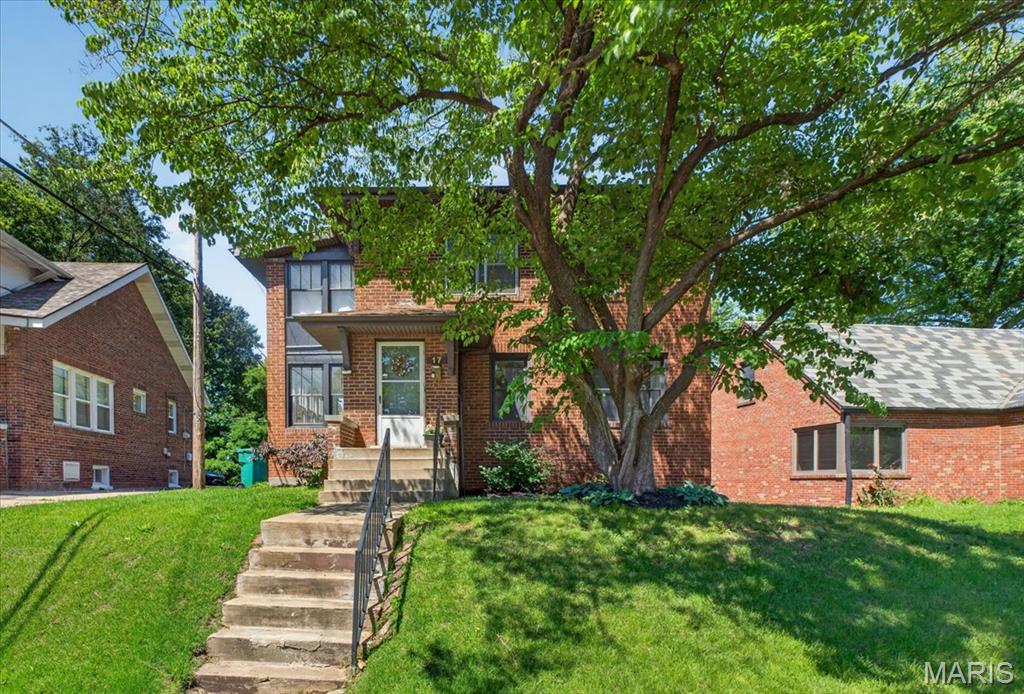 Welcome home! This delightful 2-Story home situated on a .24-acre lot in Greendale is bursting with charm. There are 4 Bedrooms, 2 full bathrooms, and over 1,600 square feet of living space! The main level includes a spacious Living Room and formal Dining Room (with refinished hardwood floors), a light and bright sunroom, a cozy family room, Kitchen  with stainless-steel appliances, full bathroom, and a main floor Bedroom. The 2nd Floor features 3 Bedrooms, a full bathroom with a granite topped vanity and tile surround rain shower, plus an additional sunroom perfect for morning coffee. The backyard and patio are perfect for entertaining and spending time outside. Don't miss out on this gem that is also offering a home warranty!