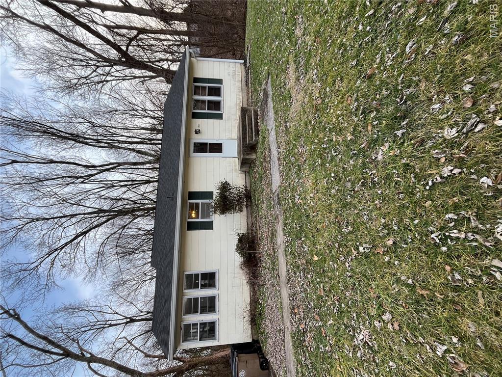 Enjoy hardwood floors and a dry basement ideal or storage or workshop in this solid two-bedroom residence. The property sits on an expansive lot, offering plenty of outdoor space for gardening or entertaining, perfect for expansion or play! Downsizing or starting out this property is for you!