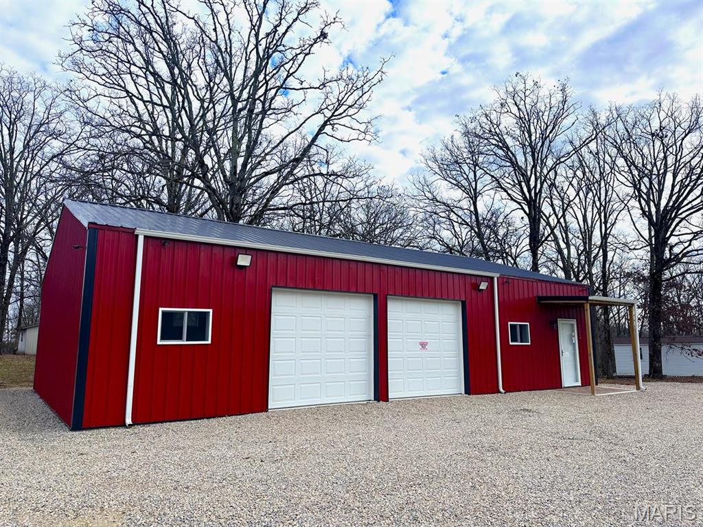 This 1,500 sq ft property is packed with potential and ready for your vision! Currently used as a commercial office and garage, it’s versatile enough to suit a wide range of needs.

Key Features:
-Two 8x9 bay doors, perfect for vehicles, farm equipment, or recreational use
-Large storage loft above the office for extra space
-Situated on 1.58 acres (+/-) with room to grow
-Convenient highway frontage for easy access and excellent visibility

Whether you’re looking to run a business, set up a personal workshop, or even create a space for a residence or RV, this property fits the bill. With its great location and flexibility, it’s an excellent investment for anyone with a plan in mind. Location: Rural