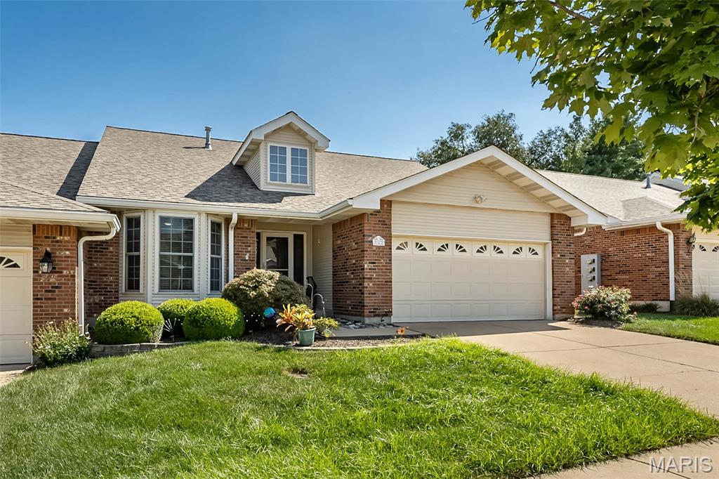 This beautifully updated Braefield villa is the one you've been waiting for!  From the moment you step inside, you’ll be greeted by luxury vinyl plank flooring flowing seamlessly throughout the main level. The primary suite is a true retreat, featuring a bay window, walk-in closet, & beautifully updated bath with a walk-in shower, separate soaking tub, adult-height double vanity with quartz countertops, & porcelain tile flooring. A second main-floor bedroom, also accented w/ a bay window, offers flexibility for guests or home office!  The vaulted great room & dining area create an inviting space filled with natural light & a direct-vent gas fireplace. The gorgeous kitchen boasts custom white cabinetry, quartz countertops, stainless steel appliances, & recessed lighting.  Just off the main living area, the enclosed vaulted sunroom provides an exceptional year-round space to enjoy your morning coffee!  The updated hall bath features a walk-in shower and quartz countertops and the spacious main-floor laundry room offers a utility sink & additional storage closet.  The finished lower level features a large recreation room, third bedroom, fourth room ideal for a bedroom, office, hobby room, or craft space, plus a third full bath. Large lookout windows fill the lower level with an abundance of natural light.  Major updates include HVAC and water heater replaced in 2023.  The sellers haven't missed a thing!  Amazing Chesterfield location...close to highway, shopping and parks!  You've got to see this!!!  Showings begin on Wednesday, September 9th!