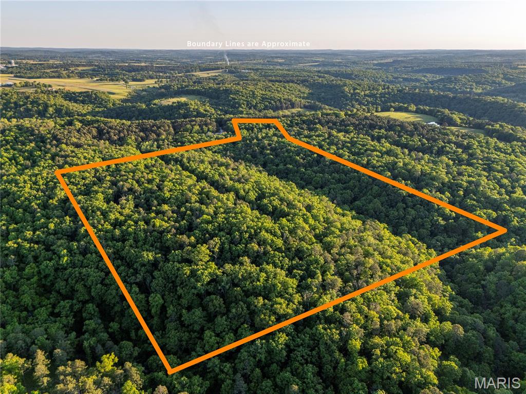 Come and see this stunning property with all the charms of the country and the
convenience of being close to town. This property is the perfect place for a
recreational/hunting property or the perfect site for your dream home. With wild game in
abundance, some trails, and a deer blind included, it is “turn-key” for fall whitetail and
turkey. A large wet weather creek towards the back of the property with plenty of rock
outcroppings and a stone talus deposit in the ravine, there is plenty to explore no matter
the time of year. With electric at the property and public water nearby, this property is
ready to go for your forever home or your rural weekend getaway! Where convenience
is concerned, this property is less than 10 minutes away from the conveniences of
Houston, MO, like shopping, hospital/medical services, and restaurants. Don’t miss out
on this truly unique property – call today for your private tour!
Additional acreage and home available – see MLS #26055597 & #26040726.