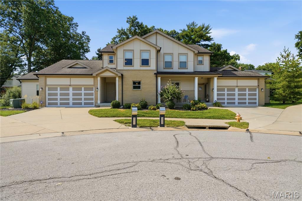 Exceptional 1.5-story villa offering 2,040 sq. ft. of thoughtfully designed living space in one of the area's most desirable communities and located in the award-winning Parkway School District. This impeccably maintained 3-bedroom, 2.5-bath home combines the convenience of main-floor living with spacious accommodations for family and guests.
The inviting open floor plan features a spacious great room with a gas fireplace, abundant natural light, and luxury vinyl plank flooring that flows seamlessly into the dining area and beautifully appointed kitchen. The kitchen offers granite countertops, stainless steel appliances, abundant cabinetry, generous workspace and breakfast bar seating —ideal for everyday living and entertaining.
The MAIN FLOOR PRIMARY SUITE provides a private retreat and en-suite bath featuring dual adult height vanities and a walk-in tiled shower. A convenient main-floor laundry room and powder room complete the first level. Upstairs, you'll find two generously sized bedrooms a large loft and a full bath, providing privacy and flexibility for family, guests, or a home office.  New carpeting installed in upper level 2026.
The full unfinished basement offers exceptional storage and endless possibilities for future expansion, including additional living space, a recreation room, bedroom, or bath. Outside, the attractive brick and maintenance-free exterior, covered front porch, and outstanding curb appeal make an impressive first impression.
Move-in ready and meticulously cared for, this villa offers the perfect combination of comfort, quality, and low-maintenance living in an outstanding location close to shopping, restaurants, parks, hospitals, and major highways.