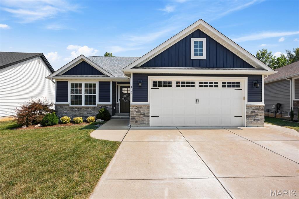 Welcome home to this beautiful Craftsman Ranch, thoughtfully designed with comfort and everyday living in mind. This 4-bedroom, 3-bath home offers easy main-level living with an open-concept floor plan and vaulted ceilings that fill the space with natural light. The kitchen shines with custom cabinetry, a center island with seating, and stainless-steel appliances—ideal for everyday life or entertaining. The primary suite features vaulted ceilings, walk-in-closet, a double vanity, and a step-in shower. Downstairs, the finished lower level adds a 4th bedroom with egress window, a full 3rd bath, a spacious rec room, and plenty of storage. Outside, enjoy a private retreat with maintenance-free white vinyl fencing and a concrete patio perfect for grilling, gathering, and evenings by the fire pit. Move-in ready and beautifully maintained—this one is ready to welcome you home. Schedule your private showing today.