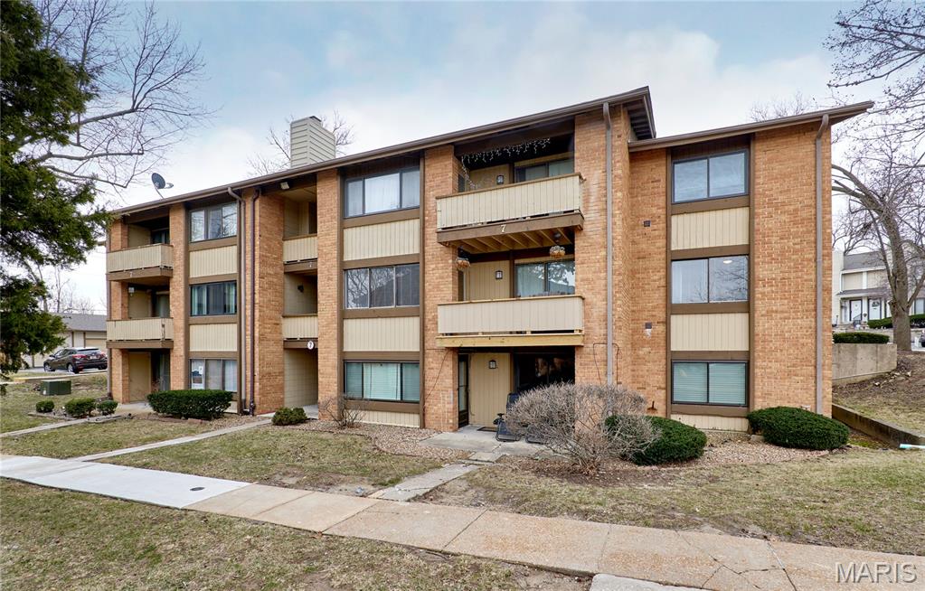 Seller will pay HOA for remainder of year (12/2026) Move-in ready ground-floor condo featuring 2 bedrooms and 1 full bath in a convenient central location. Major updates were completed in 2022, including fresh interior paint, new carpet, remodeled kitchen with stainless steel appliances and butcher block countertops, new deck (2026), updated electrical (2026) and an updated bathroom with newer vanity and toilet. 

The open floor plan connects the living room, dining area, and kitchen, creating a comfortable space for everyday living and entertaining. Large windows provide abundant natural light, and the private balcony with storage offers a quiet place to relax. From the living room you can see the community pool just a short walk away.

The primary bedroom includes private access to the bathroom. Oversized laundry closet with washer and dryer hookups and shelving, plus an additional hallway linen closet for extra storage. Basement storage locker also included.

One assigned parking space directly in front of the building. HOA fee covers water, sewer, trash, lawn care, snow removal, and community pool access. 

Ground level unit located in a suburban setting close to shopping, dining, and daily conveniences.